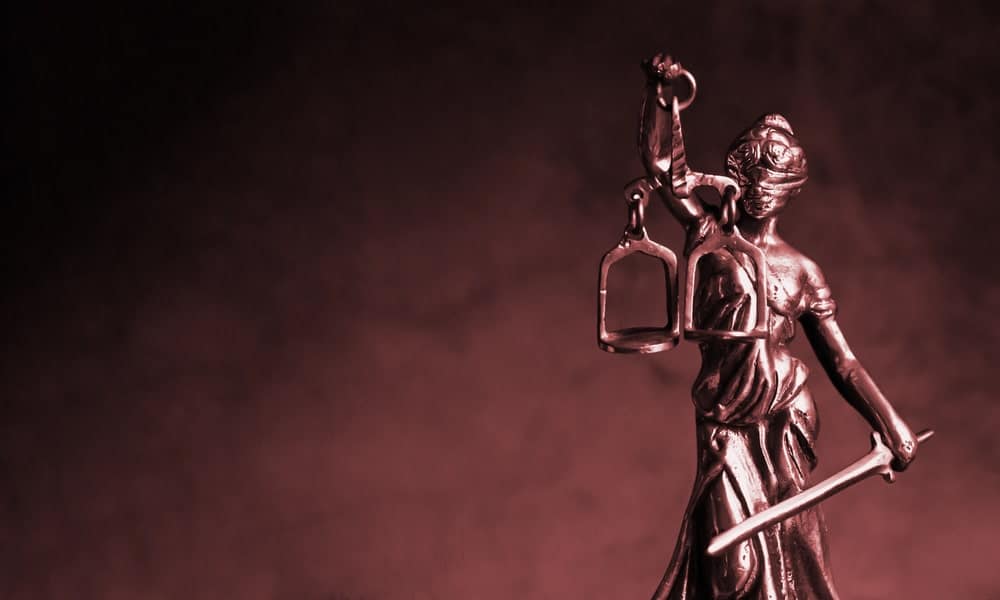 Lady Justice statue representing legal fairness and justice in MIP in Knoxville cases
