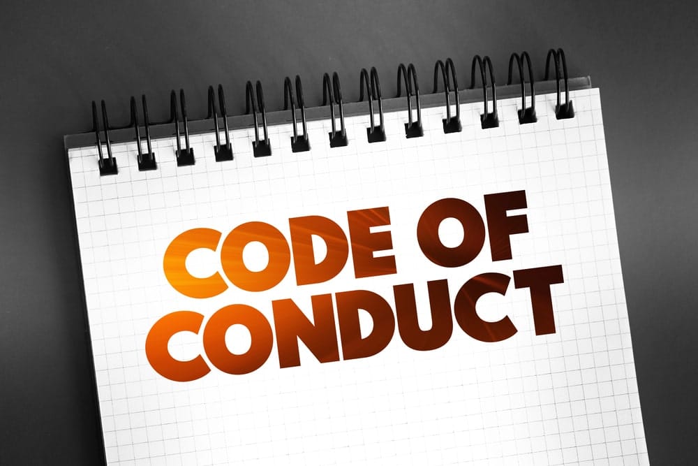 Notebook showing code of conduct rules