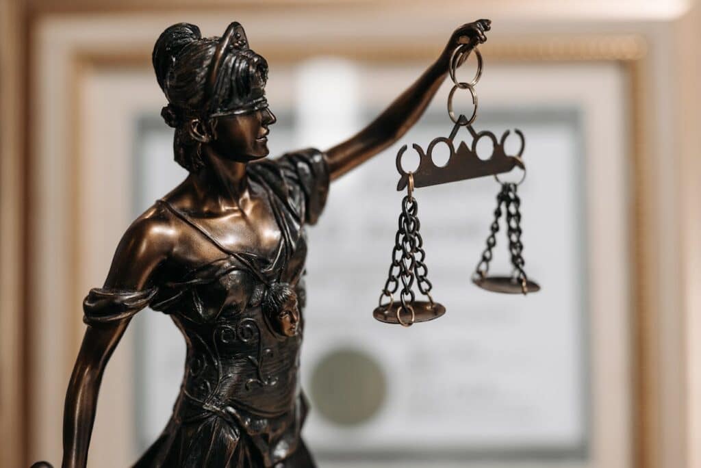Justice statue showing legal consequences
